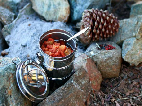stainless steel cookware with food in it