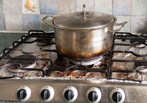 A stainless steel pot on the stove